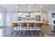 Spacious kitchen with a large center island, stainless steel appliances, and hardwood floors at 3152 Quinn Pl, Atlanta, GA 30341