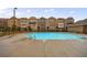 Community pool with sundeck, providing residents with a recreational gathering place to cool off and relax at 3152 Quinn Pl, Atlanta, GA 30341