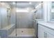 Modern glass shower with a built in bench at 3152 Quinn Pl, Atlanta, GA 30341