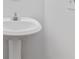 Bathroom featuring a pedestal sink with modern faucet at 3541 Parc Sw Cir, Atlanta, GA 30311