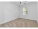 Bedroom with neutral carpet and a sunny window at 3541 Parc Sw Cir, Atlanta, GA 30311