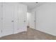 Bedroom with carpeting and features two closets with white doors at 3541 Parc Sw Cir, Atlanta, GA 30311