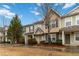 Charming townhome showcasing neutral siding, manicured landscaping, and an inviting covered entrance at 3541 Parc Sw Cir, Atlanta, GA 30311