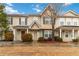 Inviting townhome exterior with covered entry, neutral siding, well-kept landscaping, and mature trees at 3541 Parc Sw Cir, Atlanta, GA 30311