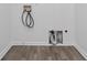 View of the laundry room hookups and flooring at 3541 Parc Sw Cir, Atlanta, GA 30311