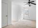 Bright bedroom with neutral carpet, a ceiling fan, and a window allowing natural light at 3773 Galdway Dr, Snellville, GA 30039