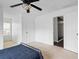 Comfortable bedroom with carpet, ceiling fan, and closet at 3773 Galdway Dr, Snellville, GA 30039