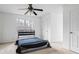 Neutral bedroom with carpet, ceiling fan, and closet at 3773 Galdway Dr, Snellville, GA 30039