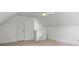 Bonus room with a ceiling fan and door at 3773 Galdway Dr, Snellville, GA 30039