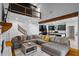 Bright living room featuring a large sectional, open floor plan, and modern finishes at 3773 Galdway Dr, Snellville, GA 30039