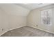 The upstairs bedroom features neutral walls, soft carpet and lots of natural light coming in from the window at 4710 Vineyard Se Ct, Smyrna, GA 30082