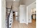 Open entryway with hardwood floors and staircase leading to the upper level at 4710 Vineyard Se Ct, Smyrna, GA 30082