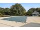 Covered community pool with a gazebo surrounded by mature trees, offering a relaxing outdoor space at 4710 Vineyard Se Ct, Smyrna, GA 30082