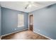 Bedroom features wood-look flooring, and neutral walls at 1057 Forest Path, Stone Mountain, GA 30088