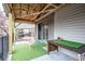 Enjoy this charming back porch area complete with a table and chairs for relaxing outdoors at 3091 Colonial Way # D4, Atlanta, GA 30341
