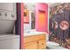 Bathroom complete with a stackable washer and dryer for laundry convenience at 3091 Colonial Way # D4, Atlanta, GA 30341