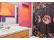 Unique bathroom featuring decorative shower curtain and bright artwork, creating a personalized and stylish space at 3091 Colonial Way # D4, Atlanta, GA 30341