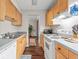 Practical kitchen layout featuring ample cabinet space and essential appliances for convenient cooking at 3091 Colonial Way # D4, Atlanta, GA 30341