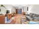 Spacious living room with a dining area, hardwood floors, and neutral paint at 3091 Colonial Way # D4, Atlanta, GA 30341