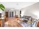 Open living room with neutral walls, wood floors, and comfortable seating at 3091 Colonial Way # D4, Atlanta, GA 30341