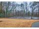 Outdoor tennis court ready for recreation in a well-maintained community setting at 3091 Colonial Way # D4, Atlanta, GA 30341