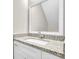 Well-lit bathroom featuring a granite countertop and a large mirror at 3236 Abbeywood Dr, Decatur, GA 30034