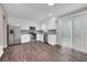 Updated kitchen with stainless appliances, white cabinets, and hardwood floors, creating a modern and functional space at 3236 Abbeywood Dr, Decatur, GA 30034