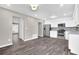 Bright kitchen with stainless steel appliances, stylish white cabinets, and durable hardwood floors at 3236 Abbeywood Dr, Decatur, GA 30034
