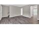 Bright living room with stylish hardwood floors and neutral walls, showcasing a welcoming space at 3236 Abbeywood Dr, Decatur, GA 30034