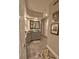 Well-lit bathroom with dual sinks, framed mirror, and stylish tile flooring at 3777 Peachtree Ne Rd # 733, Atlanta, GA 30319