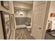Modern bathroom with a glass-enclosed shower, granite counter tops, and neutral walls at 3777 Peachtree Ne Rd # 733, Atlanta, GA 30319