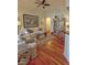 Charming living room with hardwood floors, ample seating, and stylish decor creating a comfortable and inviting atmosphere at 3777 Peachtree Ne Rd # 733, Atlanta, GA 30319