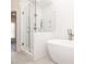 Modern bathroom featuring a frameless shower and a modern tub at 275 Briscoe Way # 3, Alpharetta, GA 30009