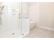 Beautiful bathroom featuring a shower with glass door and a modern tub at 275 Briscoe Way # 3, Alpharetta, GA 30009