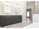 Modern bathroom with double vanity, tile floors, and an oversized tub at 275 Briscoe Way # 3, Alpharetta, GA 30009