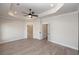Spacious main bedroom with wood floors and access to the ensuite bathroom at 275 Briscoe Way # 3, Alpharetta, GA 30009