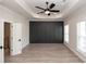 Spacious main bedroom with wood floors, recessed lighting, and a paneled wall at 275 Briscoe Way # 3, Alpharetta, GA 30009