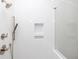 Modern shower featuring chrome fixtures, built-in niches, and herringbone tile at 275 Briscoe Way # 3, Alpharetta, GA 30009