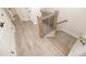 Staircase with wood railing and iron spindles at 275 Briscoe Way # 3, Alpharetta, GA 30009