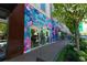 Bright Lilly Pulitzer storefront with colorful floral designs and large display windows at 275 Briscoe Way # 3, Alpharetta, GA 30009