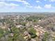 Aerial view showcases the neighborhood's tree-lined streets and homes at 743 Cedar Sw Trce, Lilburn, GA 30047