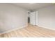 Bright bedroom features light wood floors and fresh, neutral paint at 743 Cedar Sw Trce, Lilburn, GA 30047