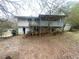 View of back of house showing balcony at 2813 Petersburg Ct, Decatur, GA 30034