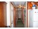 Hallway with multiple doors and carpet at 7240 Colony Ln, Douglasville, GA 30135