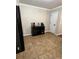 Cozy dining area with built-in black cabinet and neutral tile flooring at 7248 Mountain Laurel Way, Stockbridge, GA 30281