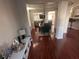 Dining room with black dining set and view to adjacent living areas at 7248 Mountain Laurel Way, Stockbridge, GA 30281
