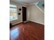 Entryway with hardwood flooring, natural light and staircase access at 7248 Mountain Laurel Way, Stockbridge, GA 30281