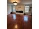 Bright living room with decorative fireplace and large windows at 7248 Mountain Laurel Way, Stockbridge, GA 30281