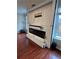 Modern fireplace in a bright living area with hardwood flooring at 7248 Mountain Laurel Way, Stockbridge, GA 30281