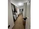 Spacious walk-in closet with built-in shelving at 7248 Mountain Laurel Way, Stockbridge, GA 30281